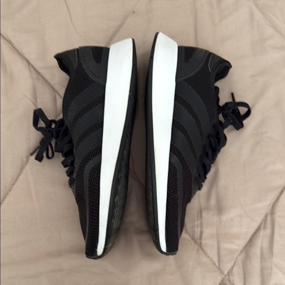 Adidas Black and White Sneakers with Sporty Low-Top Design
